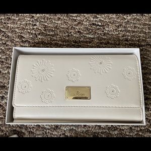Swarovski wallet never been used or taken out of box.